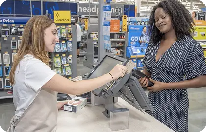Retail training scenario with employee assisting a customer at checkout