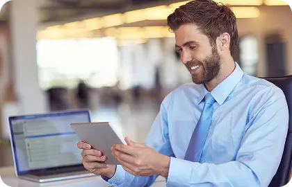 Man using a tablet in a digital workspace, representing quick access to centralized resources